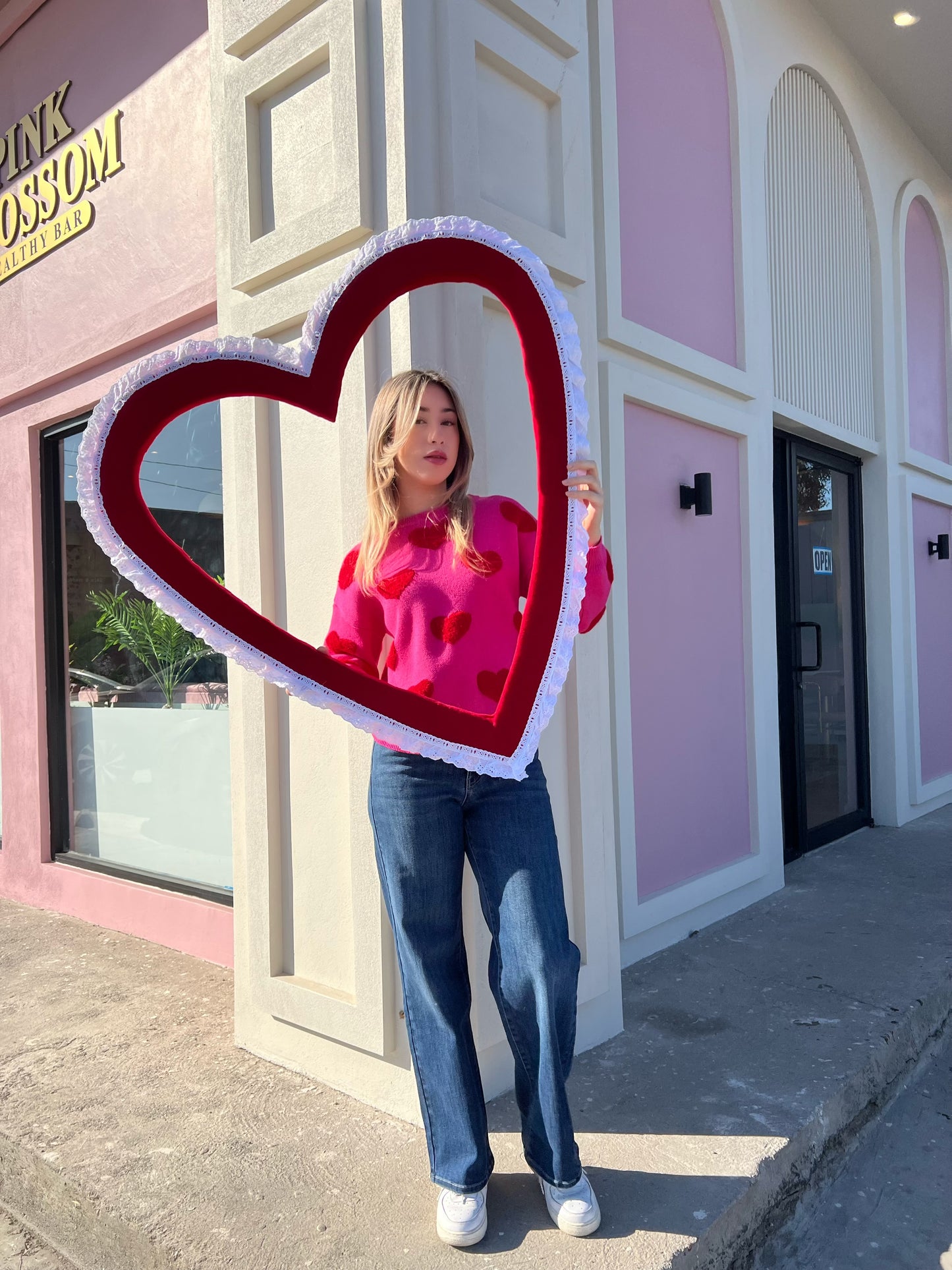 Suéter tejido fucsia con corazones #10925