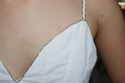 Blusa Blanca con vuelo orilla de piedritas #11319